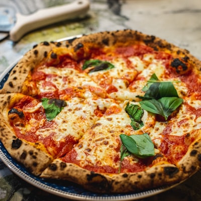 A blistered wood-fired Margherita straight out of the oven
